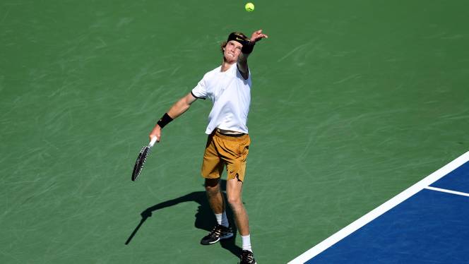 Andrey Rublev of Russia serves to Roger Federer of Switzerland during Day 6 of the Western and Southern Open at Lindner Family Tennis Center. August 15, 2019