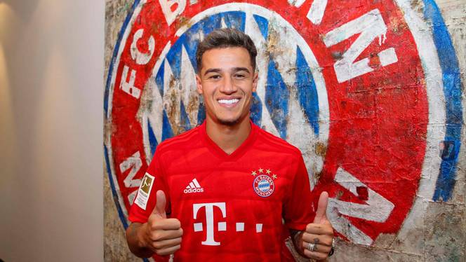 Brazilian midfielder Philippe Coutinho, new recruit of German first division Bundesliga football club FC Bayern Munich, poses in front of Bayern Munich's logo at the club's grounds in Munich, southern Germany, on August 18, 2019.