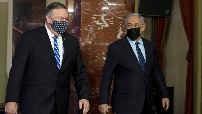 US Secretary of State Mike Pompeo, left, and Israeli Prime Minister Benjamin Netanyahu leave after making a joint statement in Jerusalem, November 19, 2020.