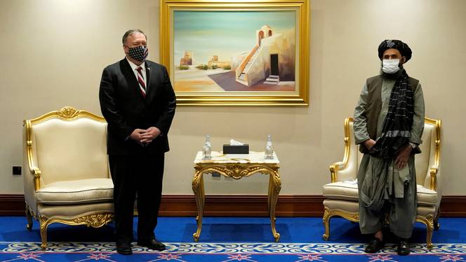 US Secretary of State Mike Pompeo meets with Taliban chief negotiator Mullah Abdul Ghani Baradar in Doha, Qatar, on November 21, 2020.