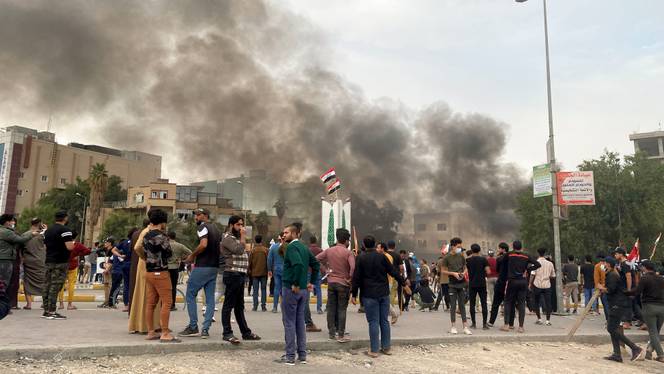 Clashes between anti-government protesters and supporters of Iraqi Shia cleric Moqtada al Sadr ensue in Nasiriya, Iraq on November 27, 2020.