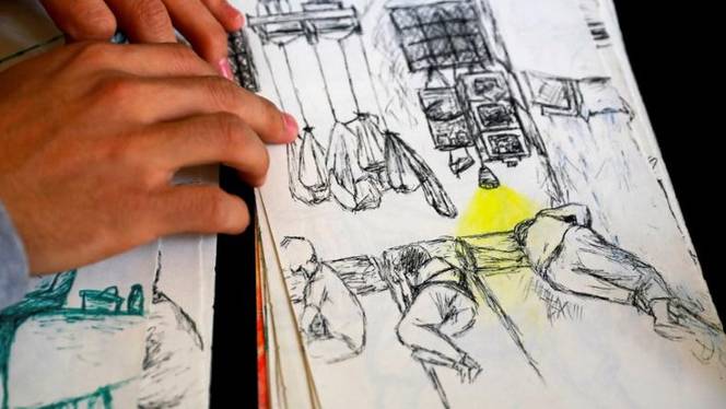 The sketch of sleeping prisoners by the artist and ex-political convict Yassin Mohamed is seen during his interview with Reuters in Cairo, Egypt, April 24, 2019.