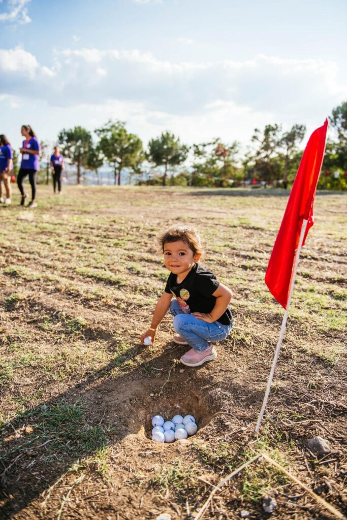 A young resident of Eziler village in Denizli during the golf tournament.