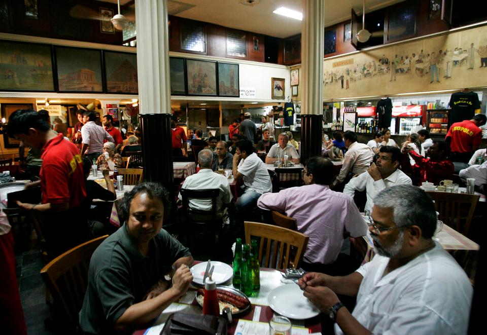 Some Irani cafes have reinvented themselves to be the cool backpacker and drinking place, like Café Leopold in southern Mumbai.