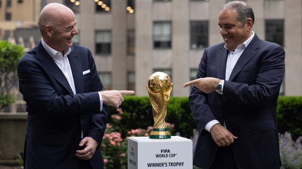 FIFA president Gianni Infantino (L) says the sites of the first game and the final were not yet decided.