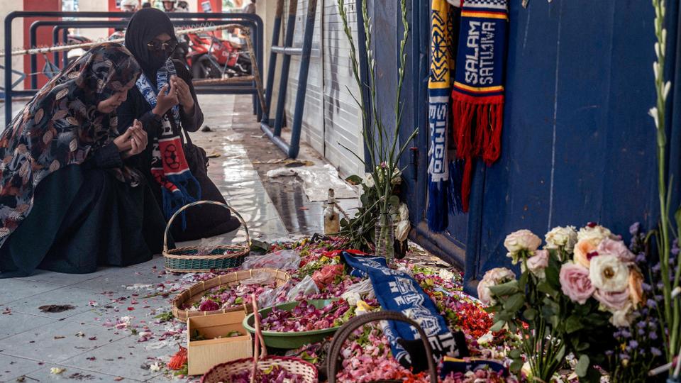 Witnesses say the tragedy, which has killed 131 people,  unfolded after police officers fired tear gas into packed stands to quell a pitch invasion.