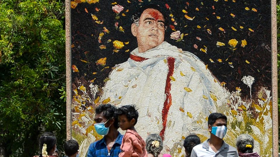 in this file photo taken on May 19, 2022, people visit a memorial of former prime minister Rajiv Gandhi in Sriperumbudur.