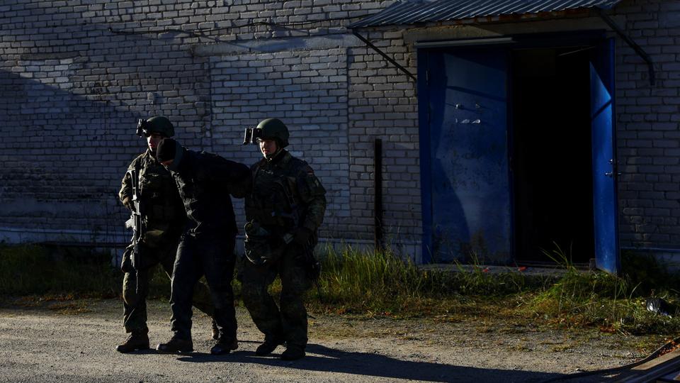 Members of the German Air Force Regiment take part in a house to house fighting exercise, during the Baltic Tiger 2022 binational military exercise, which is a contribution at NATO's eastern flank, near Amari, Estonia.