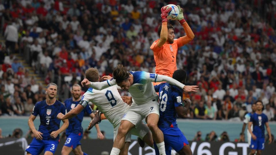 USA's goalkeeper #01 Matt Turner saves a shot during the Qatar 2022 World Cup Group B football match between England and USA at the Al-Bayt Stadium.