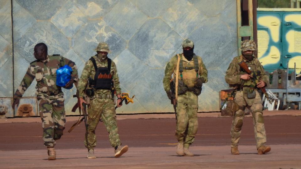 This undated file photograph issued by the French military shows three Russian mercenaries in northern Mali.