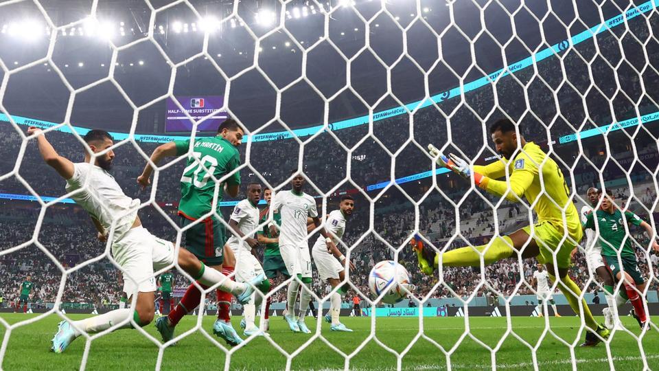 Mexico's Henry Martin scores their first goal.
