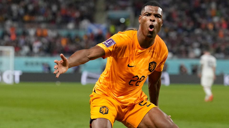 Denzel Dumfries of the Netherlands celebrates scoring his side's 3rd goal during the World Cup round of 16 soccer match between the Netherlands and the United States, at the Khalifa International Stadium in Doha, Qatar, Dec. 3, 2022.