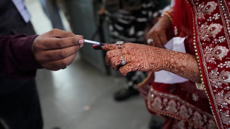 Millions of Indians queued outside polling stations in Gujarat to cast votes in numerous districts across the state.
