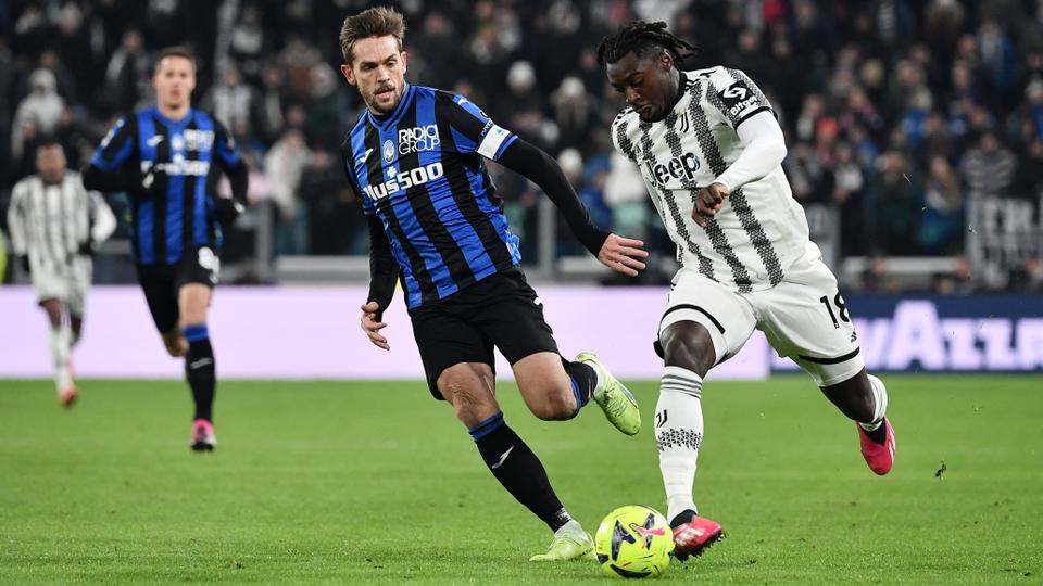 Atalanta's Italian defender Rafael Toloi (L) fights for the ball with Juventus' Italian forward Moise Kean during the Italian Serie A football match between Juventus and Atalanta at the Juventus Stadium in Turin, on January 22, 2023.