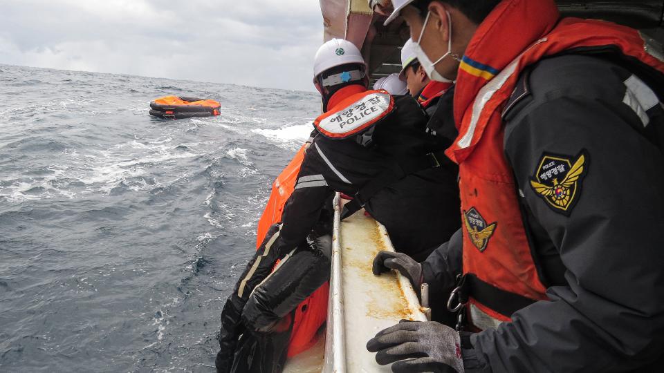 Coast guards from South Korea and Japan, joined by military aircraft and a private vessel, located 13 of the 22 people who were onboard the Jin Tian cargo vessel.