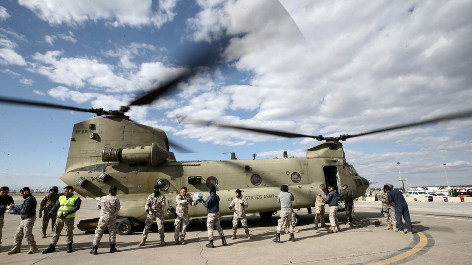 Aid packages from cities in Türkiye and many countries are loaded to military helicopters by Turkish and US soldiers at Incirlik Air Base on February 15, 2023.