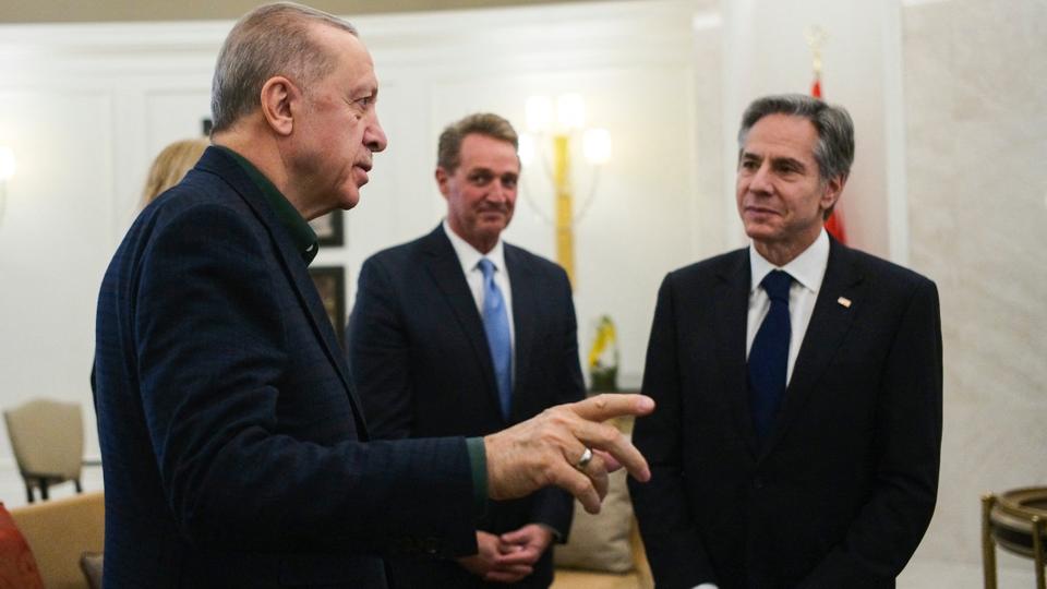 Turkish President Recep Tayyip Erdogan talks to US Secretary of State Antony Blinken during their meeting in Ankara on Monday.
