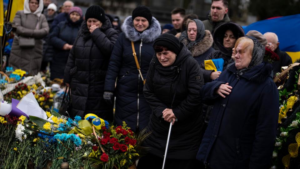 A Ukrainian family mourns the death of a relative killed during fighting against Russian forces in Bakhmut.