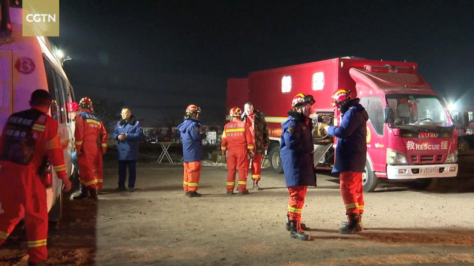 Rescue workers are seen at the site of a collapsed coal mine in Alxa League, Inner Mongolia Autonomous Region, China.