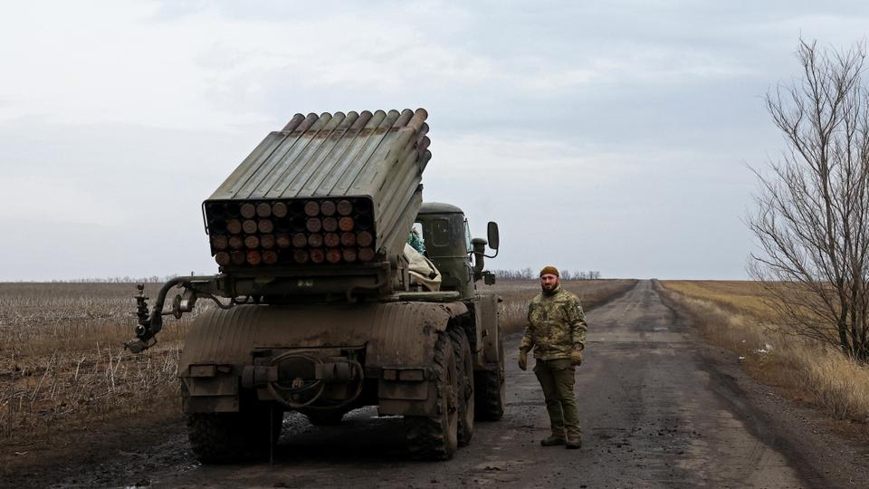 A Ukrainian serviceman of a fire platoon waits for order to fire a rocket near the frontline, as Russia's attack on Ukraine continues, in Donetsk region.