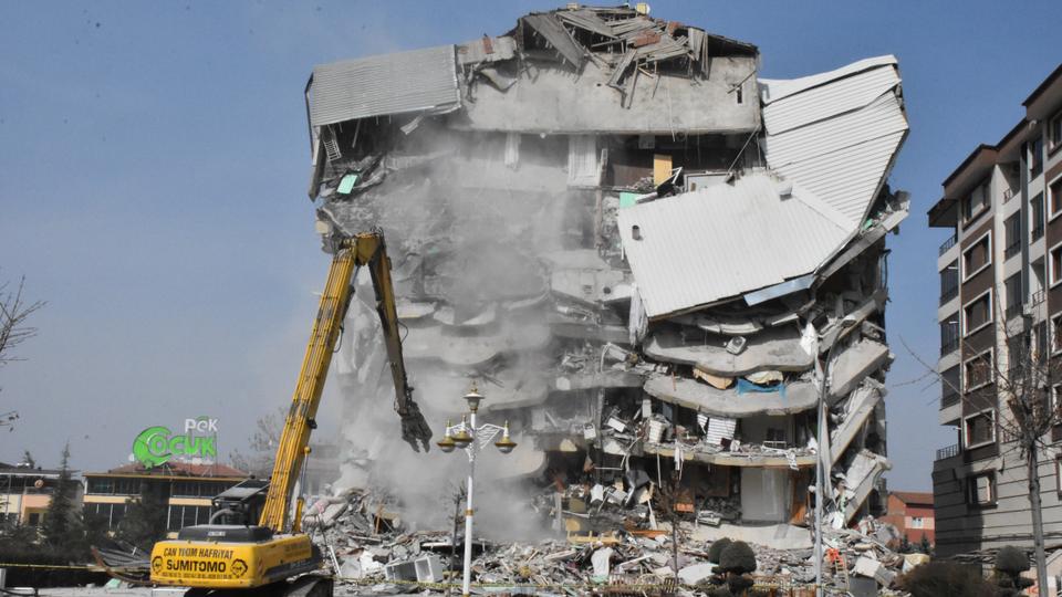 A damaged building is being torn down in earthquake-hit Malatya province.