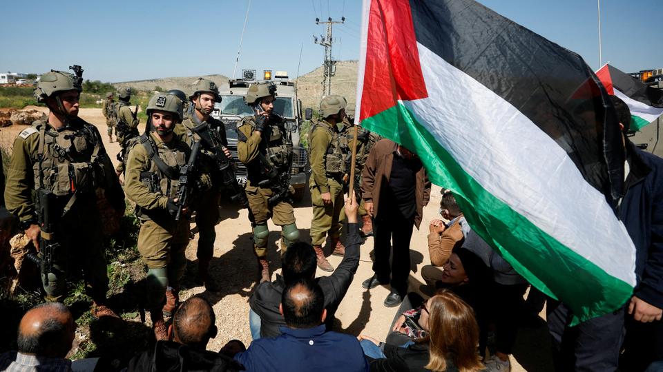 Palestinians protest against illegal Israeli settlements near Ramallah.