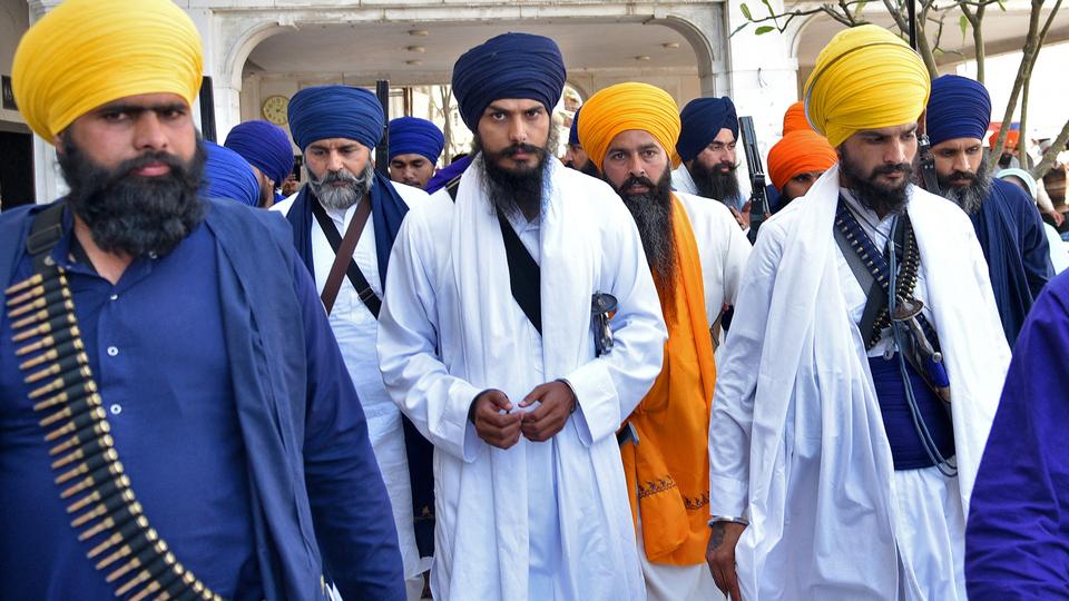 On the run since last week, Amritpal Singh [centre] maintains striving for a separate country, that Sikhs call Khalistan, was not an anti-democratic and should not be taboo.