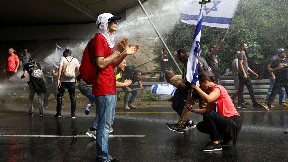 Thursday's vote came as Netanyahu's government pushes forward a separate divisive judicial reform programme, which critics say threatens Israeli democracy and has sparked mass protest.