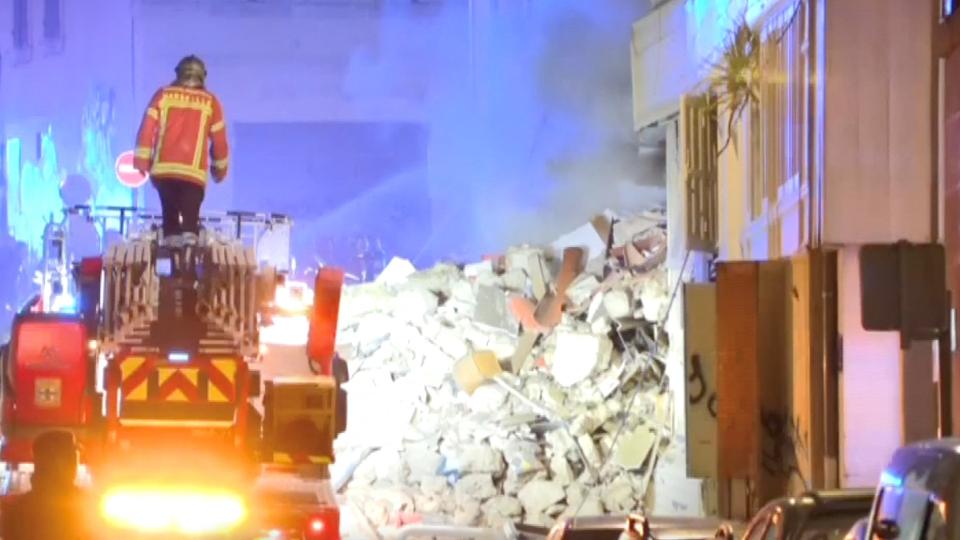 Emergency workers continued rescue operations through Sunday night into the early hours of Monday with the help of a crane and lights.