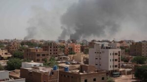 Smoke rises from a central neighbourhood of Khartoum.