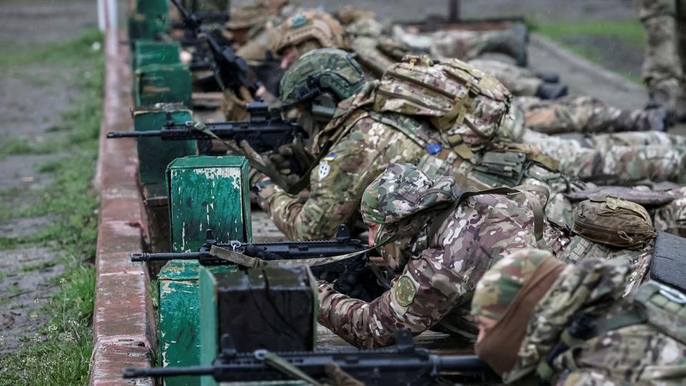 Recruits of the Spartan storm brigade of the Ukrainian National Guard practise at the unit's base in Kharkiv region.