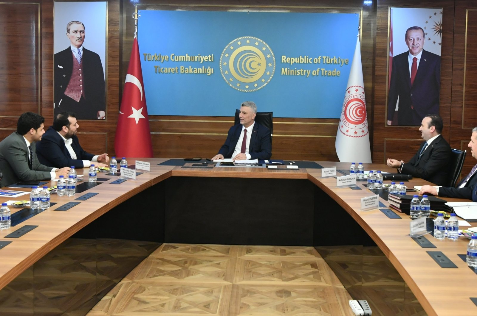 Türkiye’s Trade Minister Ömer Bolat (C) meets with Mohamed Hassan Alsuwaidi (L), the chief executive officer of Abu Dhabi Development Holding (ADQ), at the ministry's headquarters, in Ankara, Türkiye, July 3, 2023. (Twitter Photo: @omerbolatTR)