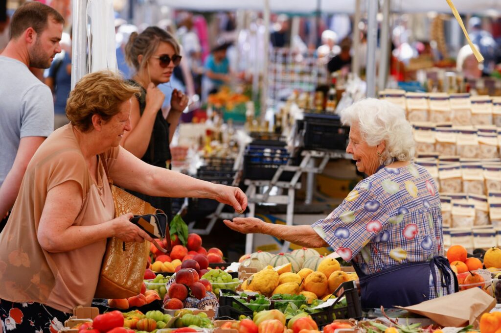 A woman shops at Campo de' Fiori market, in Rome, Italy, June 15, 2022. (Reuters Photo)