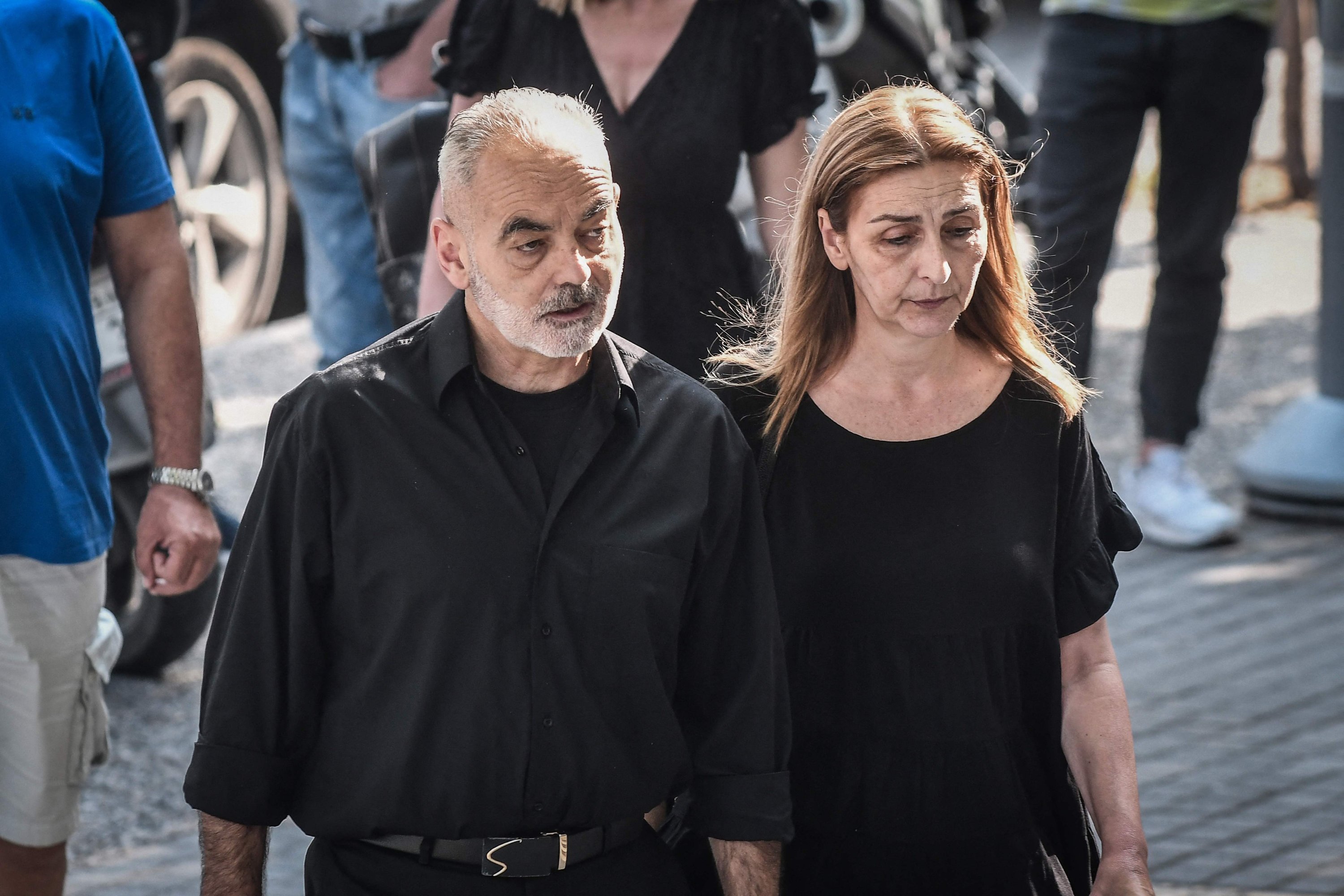 282264 The parents of late football fan Alkis Kampanos, a 19-year-old supporter beaten to death in February 2022, arrive at the courthouse, Thessaloniki, Greece, July 12, 2023. (AFP Photo)