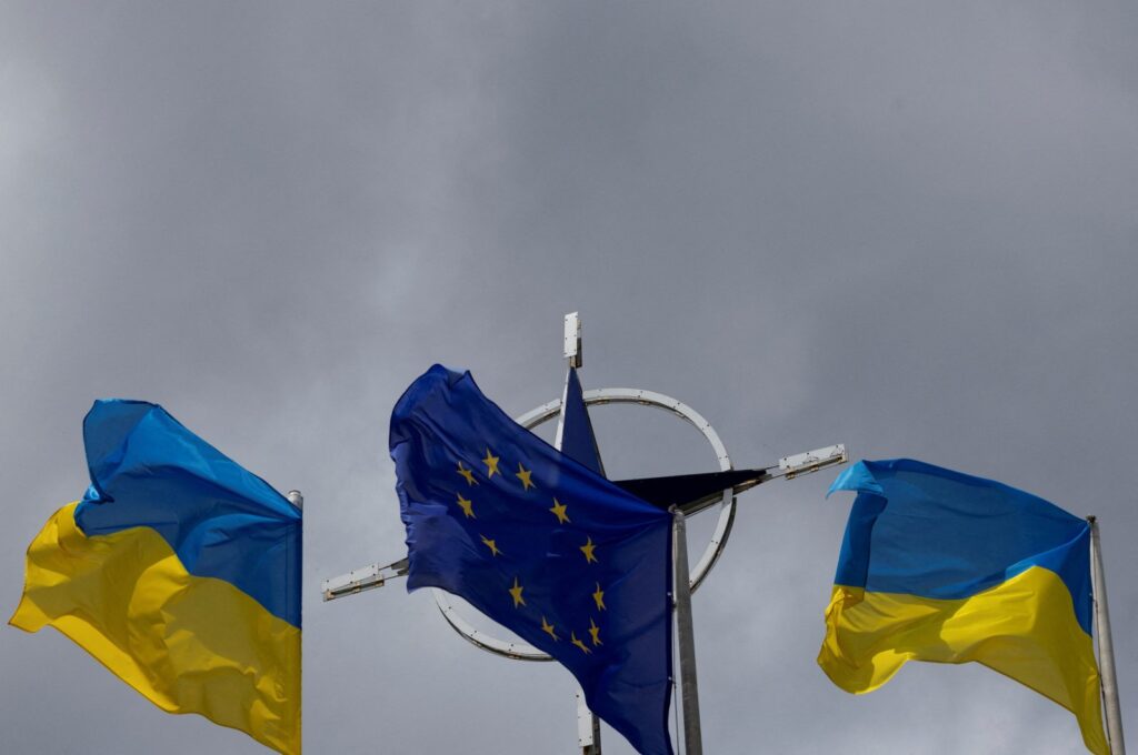 National flags of Ukraine and the European Union rise in front of the NATO emblem, amid Russia's attack on Ukraine, in central Kyiv, Ukraine, July 11, 2023. (Reuters Photo)