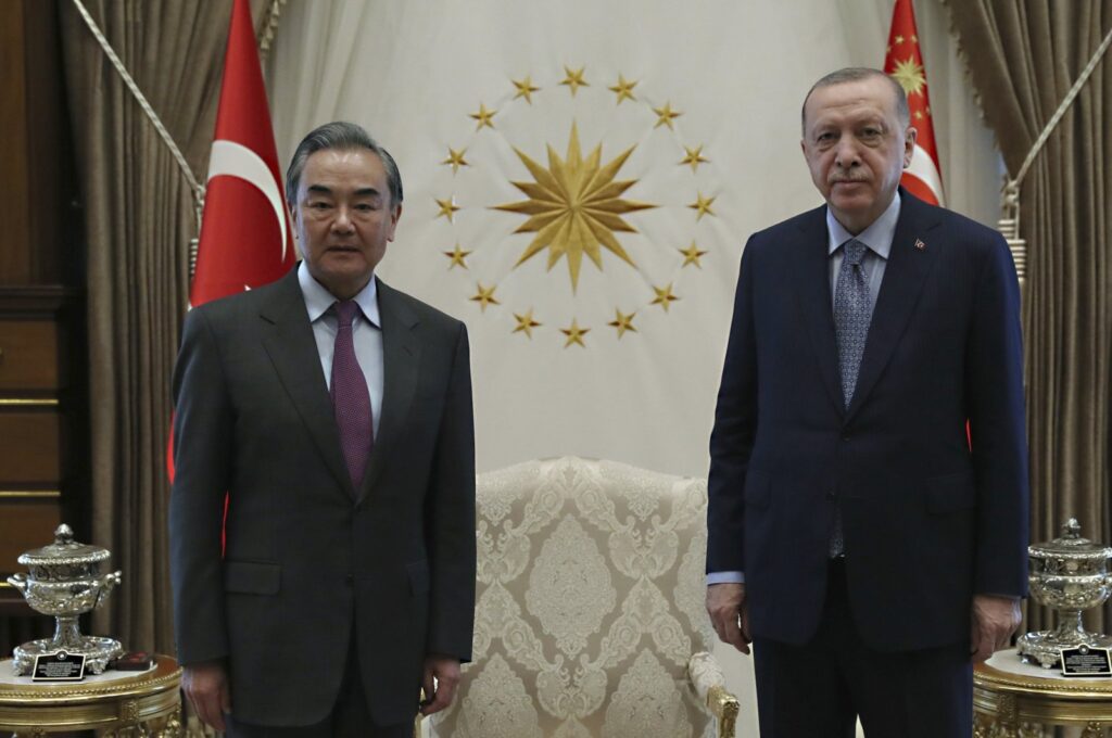 President Recep Tayyip Erdoğan (R) and Chinese Foreign Minister Wang Yi pose for photos before a meeting, in Ankara, Türkiye, March 25, 2021. (AP Photo)