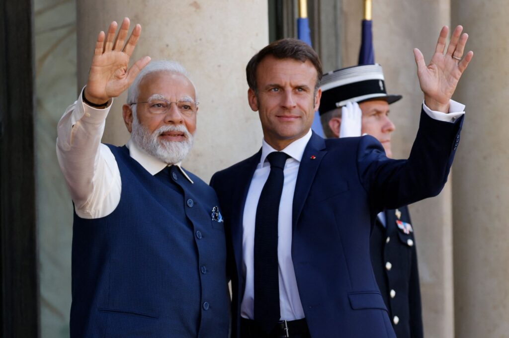 France's President Emmanuel Macron (R) welcomes India's PM Narendra Modi at The Elysee Presidential Palace, Paris, France, July 14, 2023. (AFP Photo)