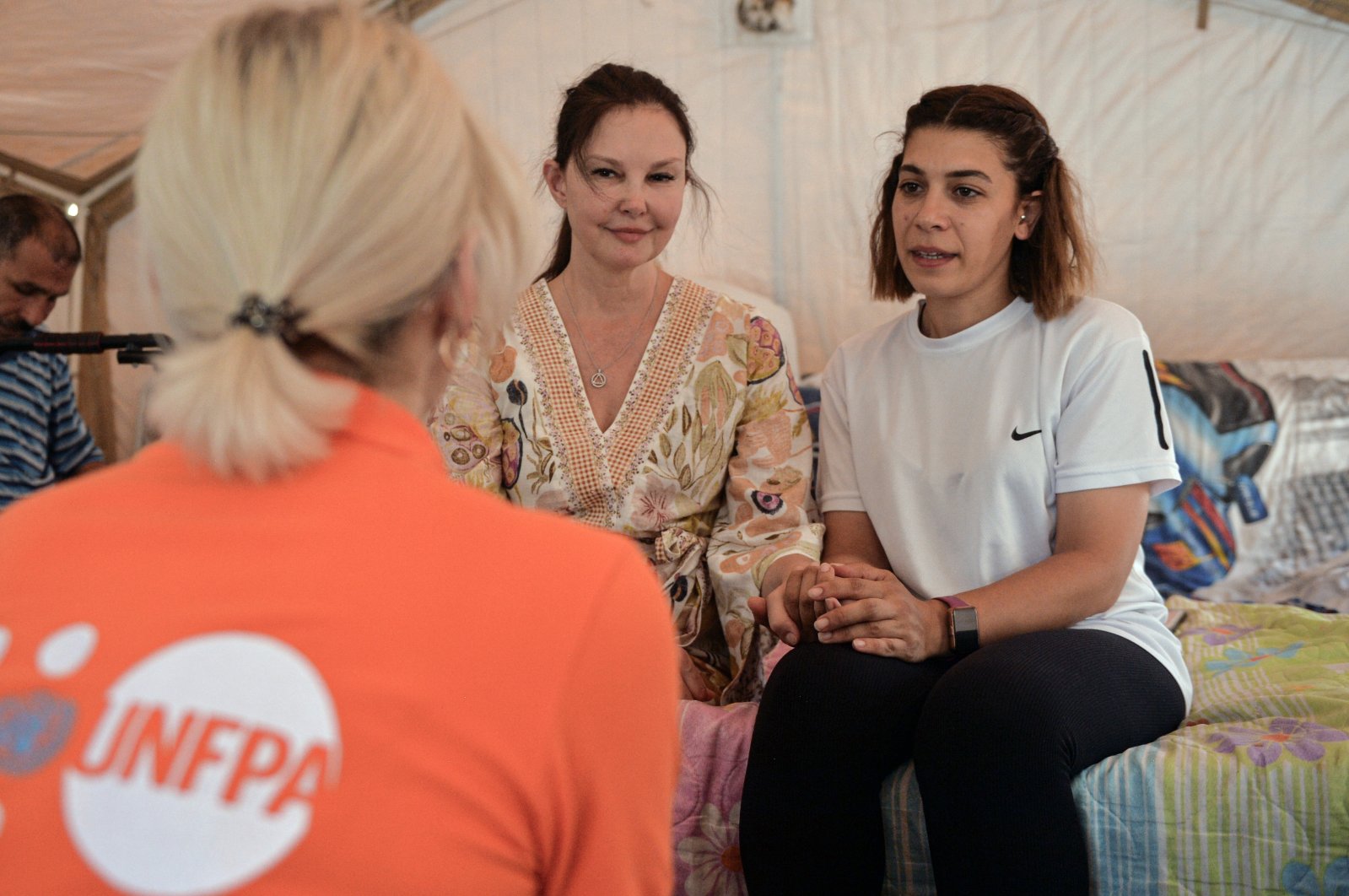 American actress and global goodwill ambassador of the United Nations Population Fund Ashley Judd (C) visits a tent erected in Kahramanmaraş, Türkiye, July 16, 2023. (AA Photo)