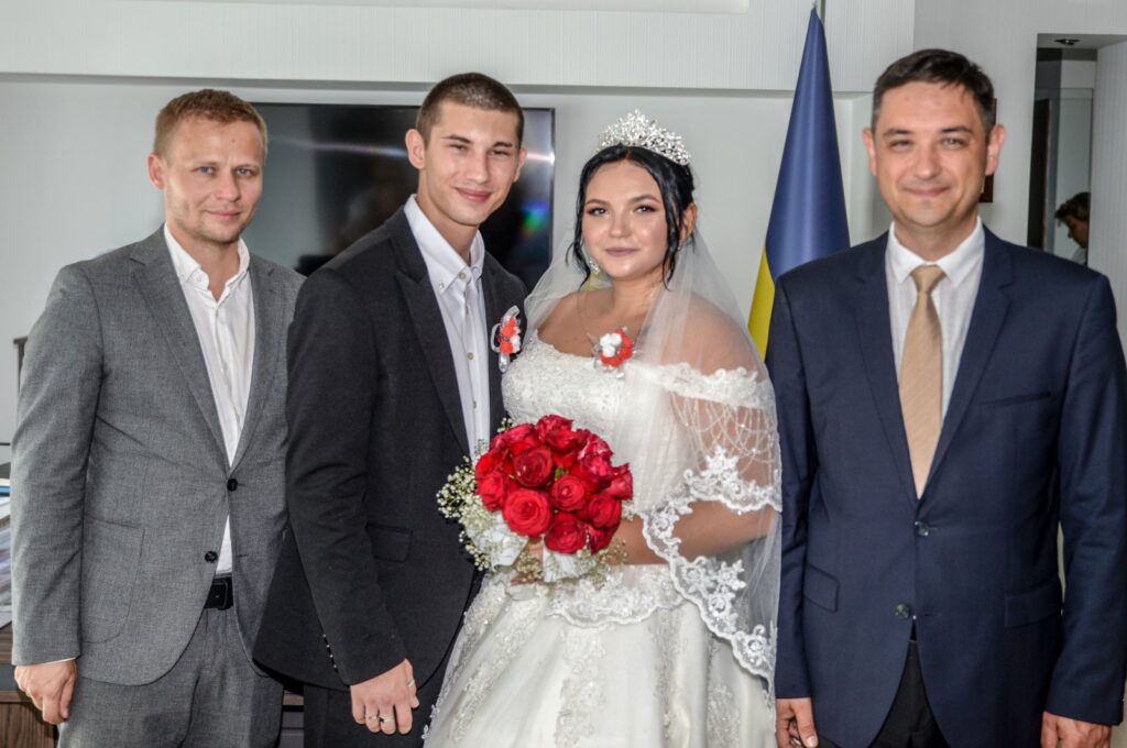 Artur Borysov and Diana Hliebova, both orphans from war-torn Ukraine, pose during their wedding in the Consulate General of Ukraine, Antalya, Türkiye, July 19, 2023. (AA Photo)