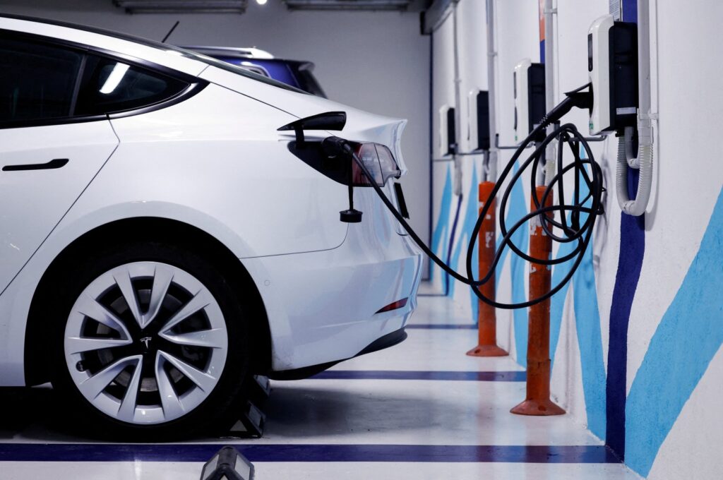 An electric vehicle is plugged into a charging station in Bilbao, Spain, Feb. 15, 2023. (Reuters Photo)