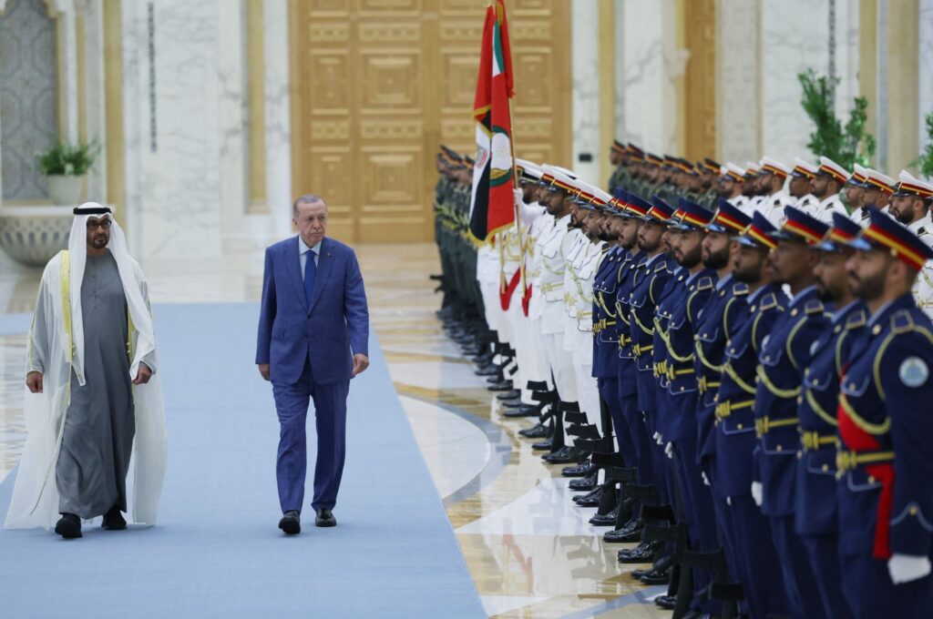 UAE's President Mohamed bin Zayed al-Nahyan (L) welcomes Türkiye's President Recep Tayyip Erdoğan in Abu Dhabi, July 19, 2023. (Turkish Presidential Communications Directorate via AFP)