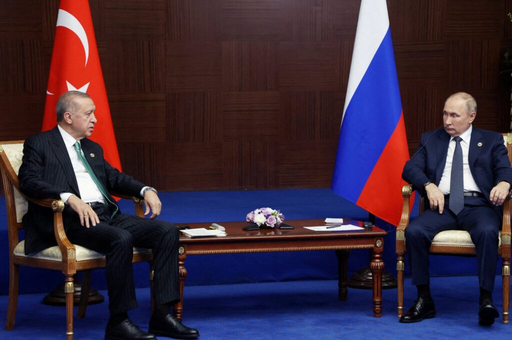 President Recep Tayyip Erdoğan (L) and Russian President Vladimir Putin meet on the sidelines of the sixth summit of the Conference on Interaction and Confidence-building Measures in Asia (CICA), in Astana, Kazakhstan, Oct.13, 2022. (Reuters Photo)