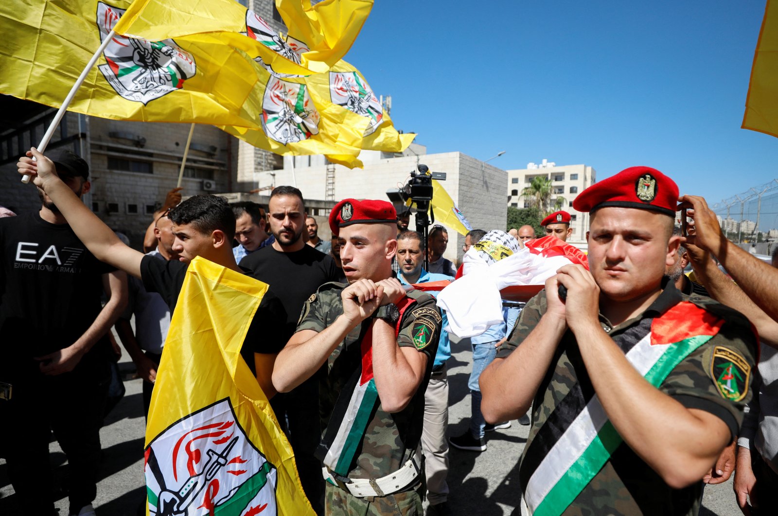 Mourners carry the body of a Palestinian teen killed by Israeli army in Nablus, in the Israeli-occupied West Bank, July 20, 2023. (Reuters Photo)