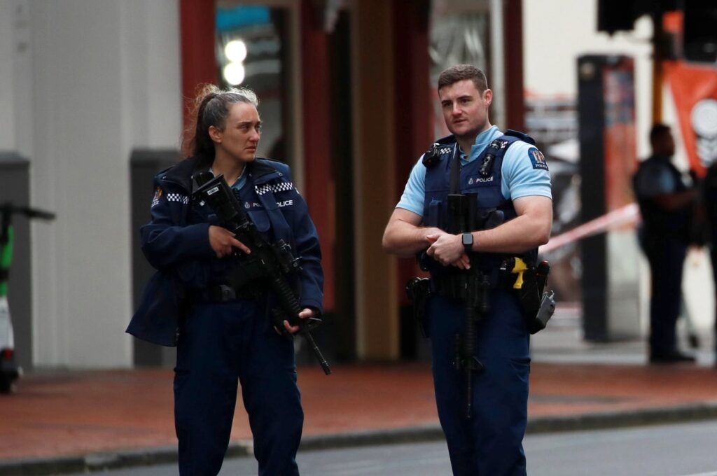 Police stand guard at a cordoned off area near the site of a shooting, in Queen Street, Auckland, New Zealand, July 20, 2023. (EPA Photo)