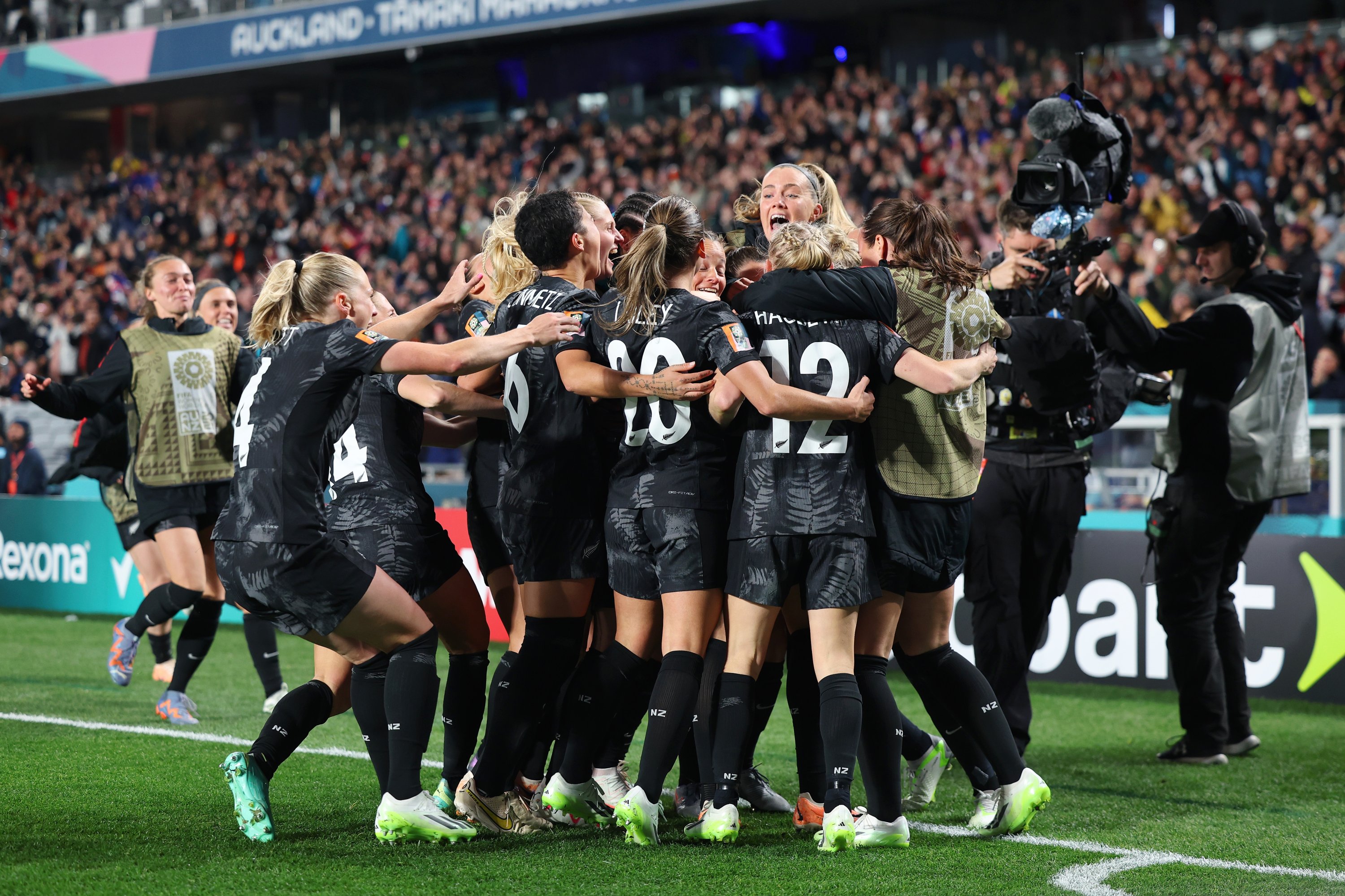 283552 New Zealand players celebrate the team's first goal scored by Hannah Wilkinson (obscured) during the FIFA Women's World Cup Australia & New Zealand 2023 Group A match between New Zealand and Norway at Eden Park, Auckland, New Zealand, July 20, 2023. (Getty Images Photo)