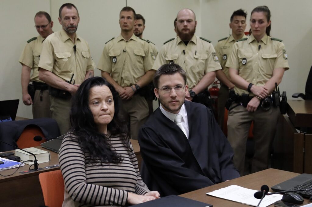 Beate Zschaepe, the sole surviving member of the NSU (L), sits in the courtroom beside her lawyer, in Munich, Germany, June 20, 2017. (AP Photo)