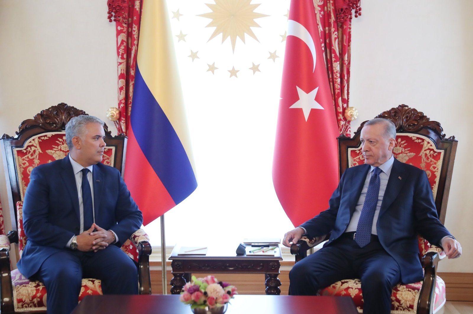A handout photo from the Turkish President's Press Office shows President Recep Tayyip Erdoğan (R) speaking with the President of Colombia Ivan Duque Marquez before their meeting in Istanbul, Türkiye, May 20, 2022. (EPA Photo)