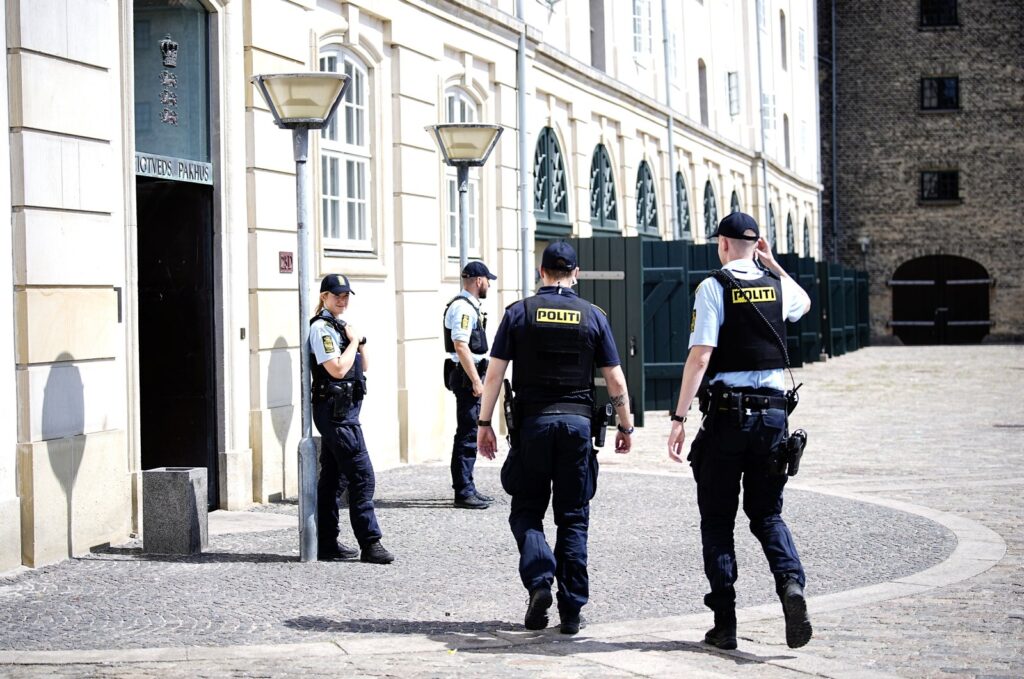 Police officers guard the entrance to the Eigtveds Pakhus, a venue for international meetings and conferences used by Denmark's Ministry of Foreign Affairs, in Copenhagen, Denmark, June 24, 2023. (EPA File Photo)
