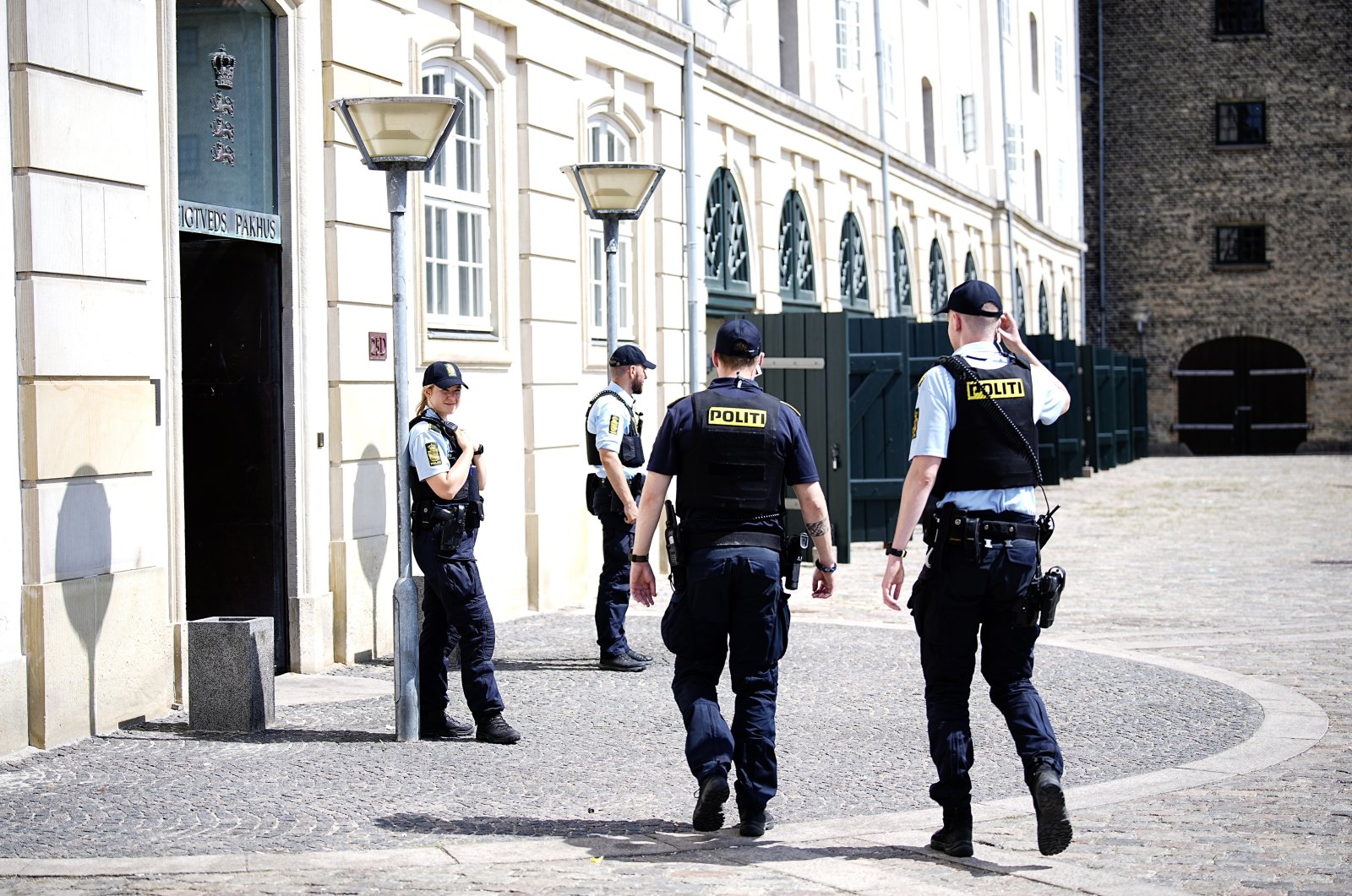 Police officers guard the entrance to the Eigtveds Pakhus, a venue for international meetings and conferences used by Denmark's Ministry of Foreign Affairs, in Copenhagen, Denmark, June 24, 2023. (EPA File Photo)
