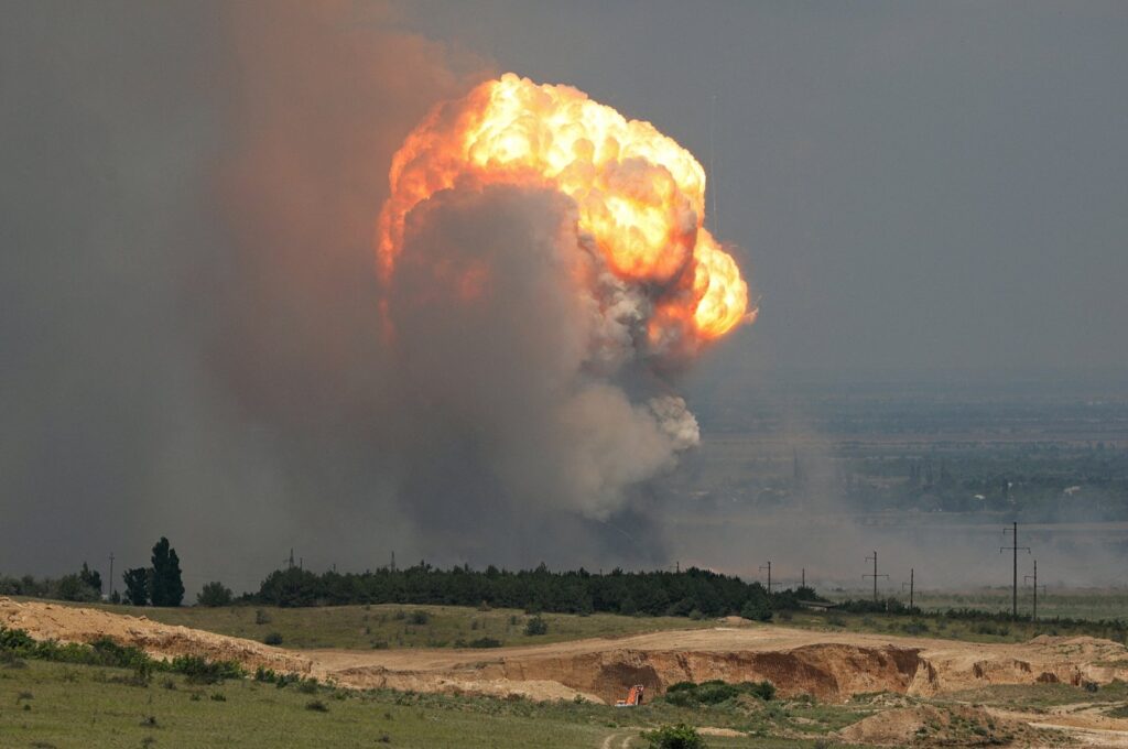 Smoke and flames rise from an explosion during a fire at a military training ground in the Kirovske district, Crimea, July 19, 2023. (Reuters Photo)